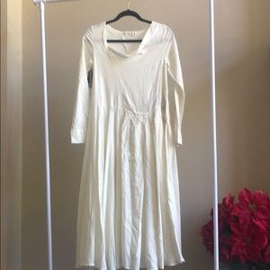 White dress with embroidery details